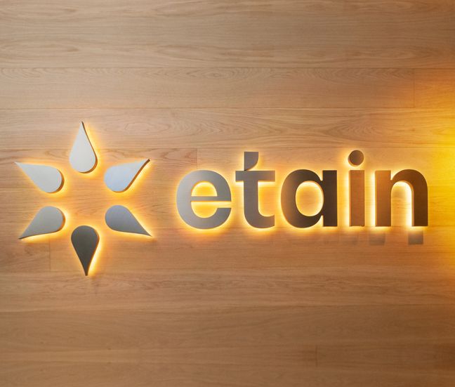 Etain logo on wood background
